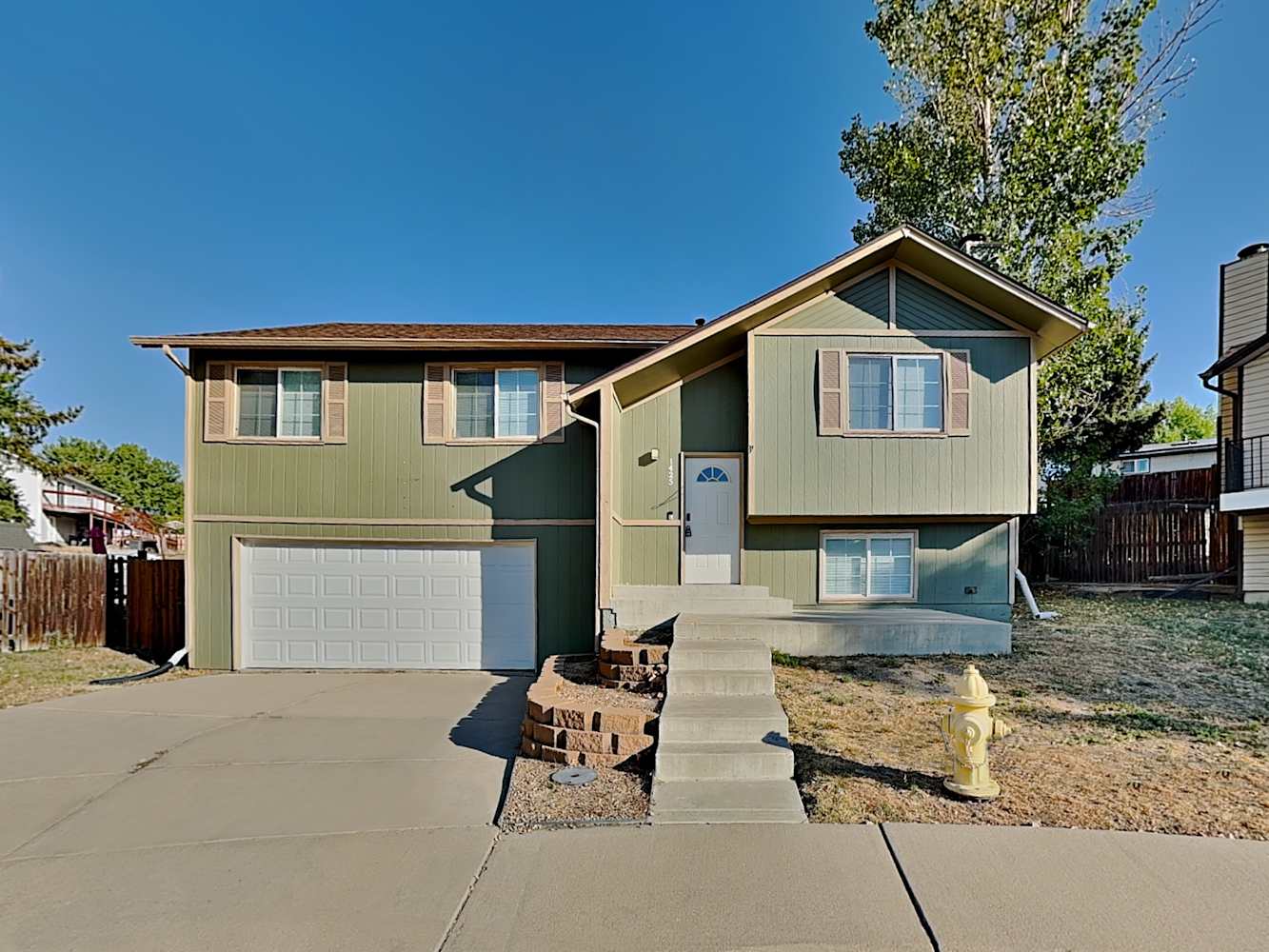 Front of 1425 E 97Th Pl, Thornton, CO