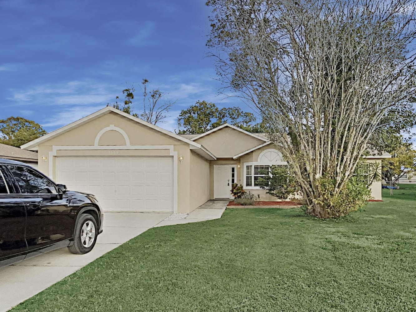 Front of 1669 Templewood Ave, Deltona, FL
