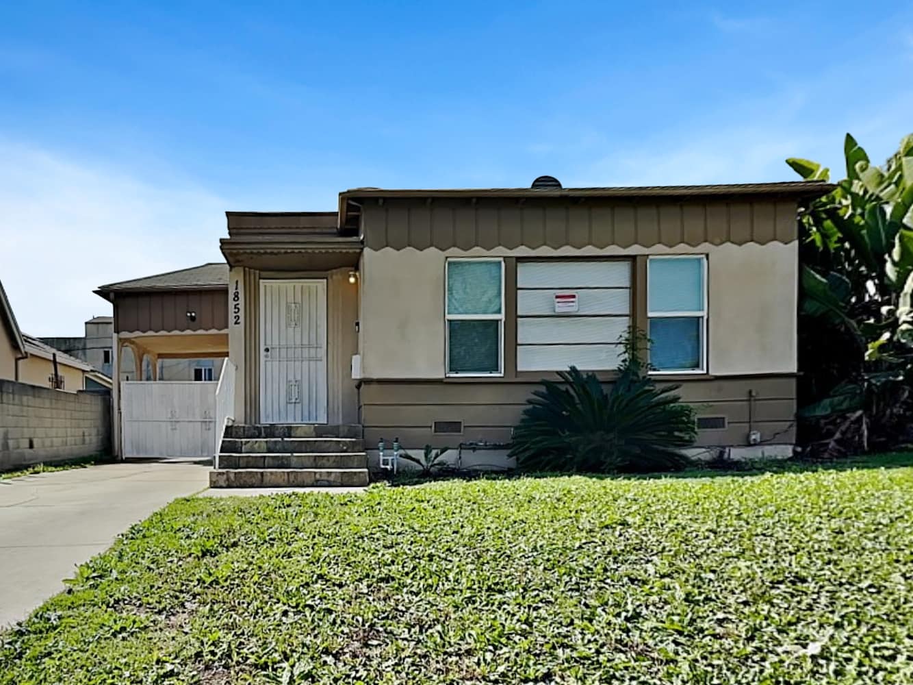 Front of 1852 W 78th St, Los Angeles, CA