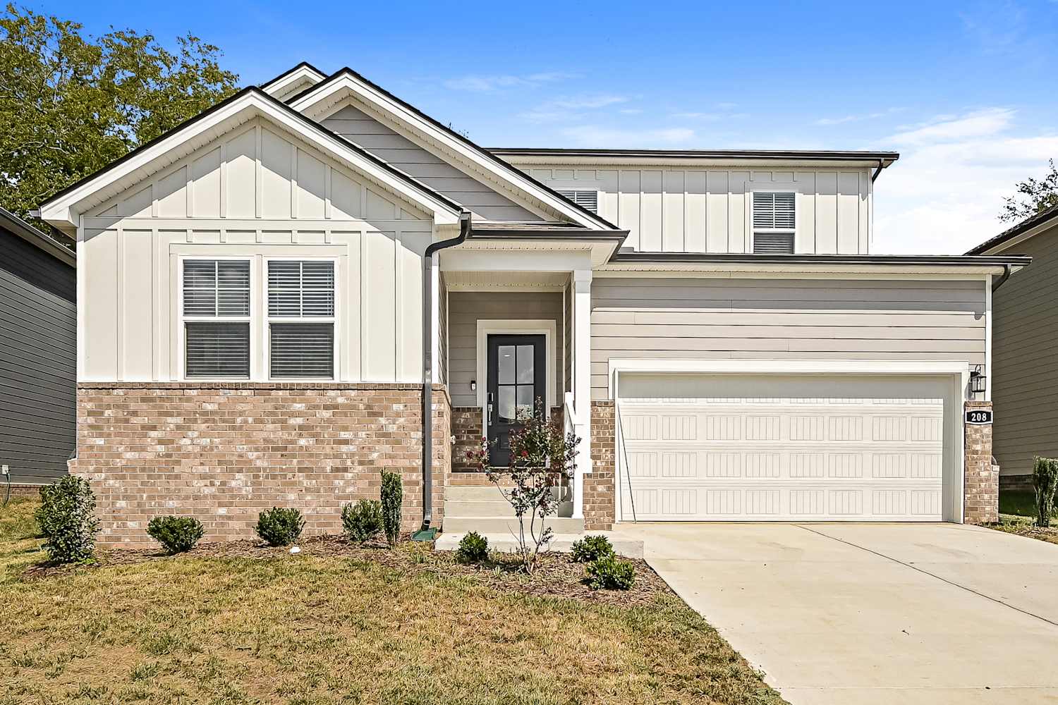 Front of 208 East Millbrook Dr, Spring Hill, TN