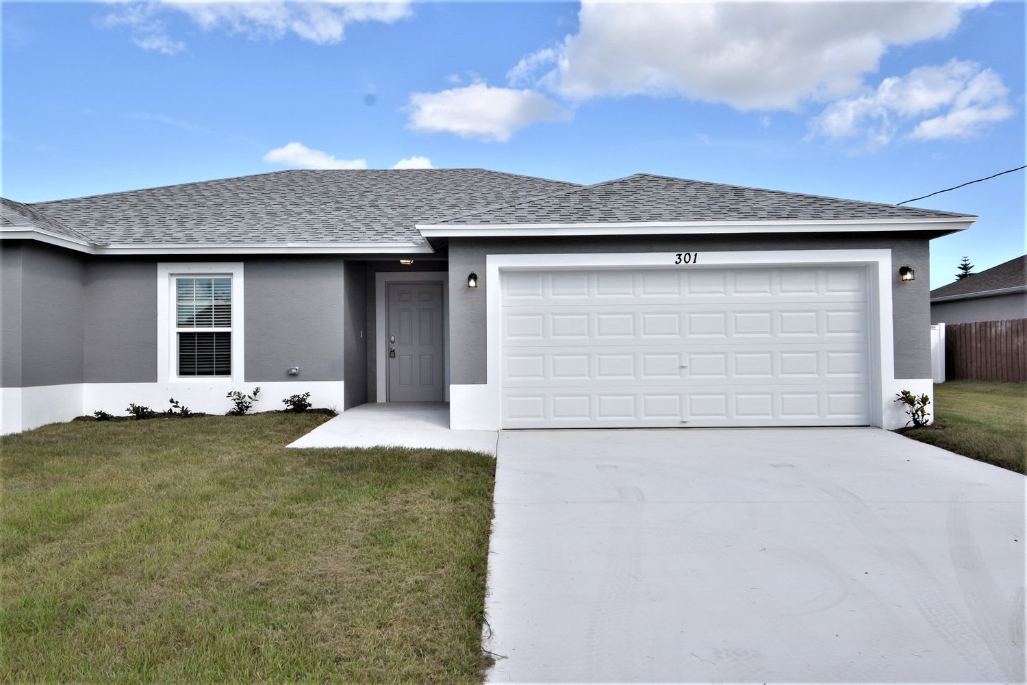 Front of 301 SW Log Dr, Port Saint Lucie, FL