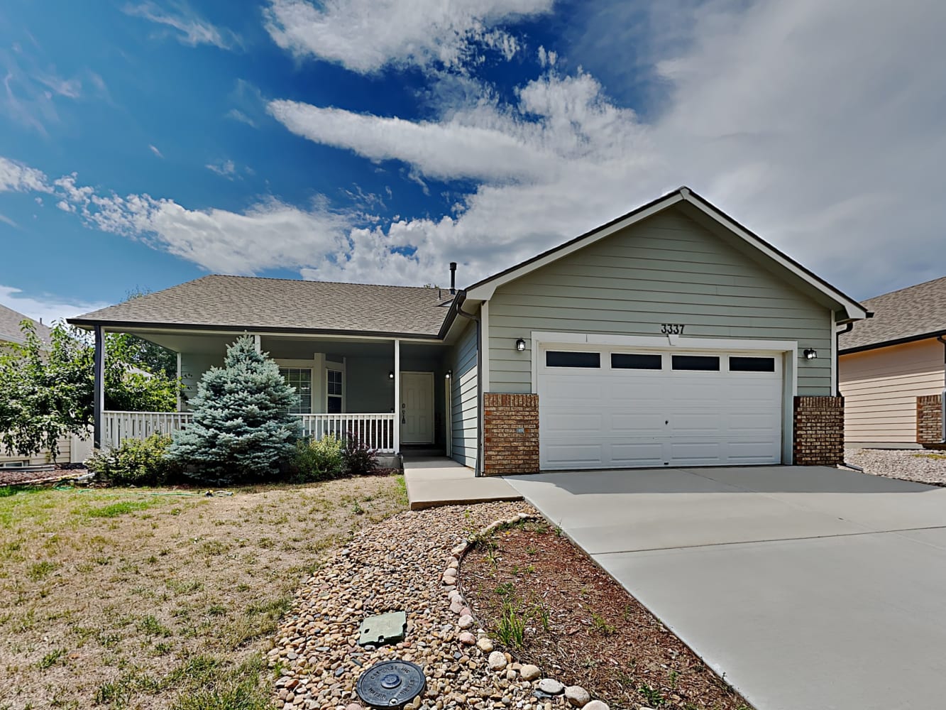 Front of 3337 Grenache St, Evans, CO