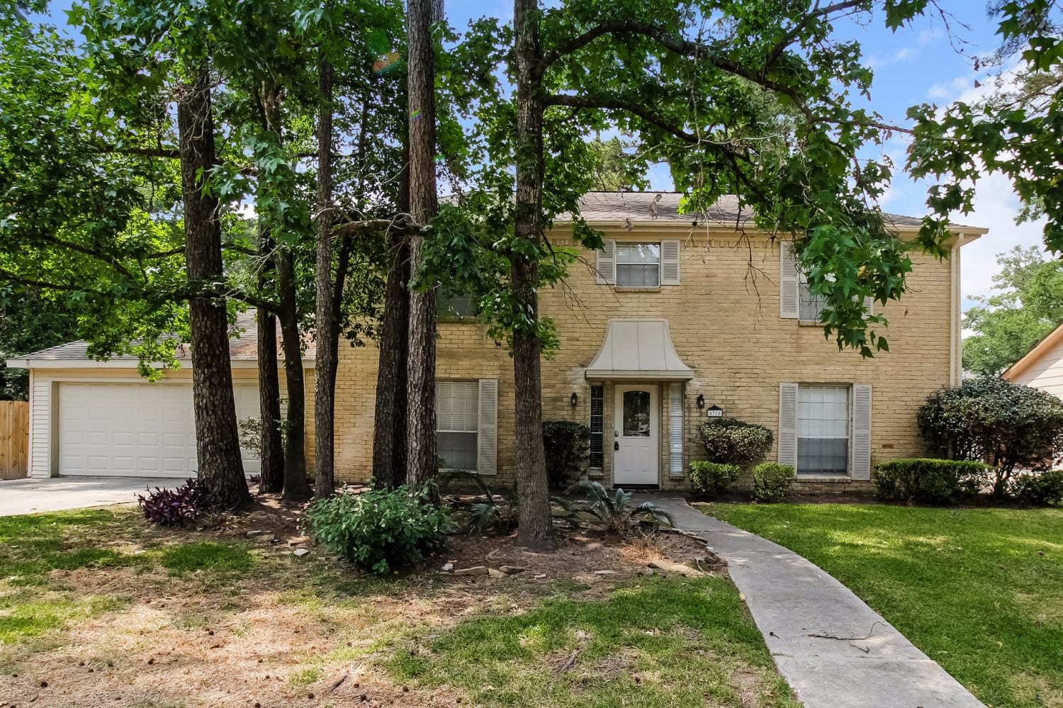 Front of 5318 Woodville Ln, Spring, TX