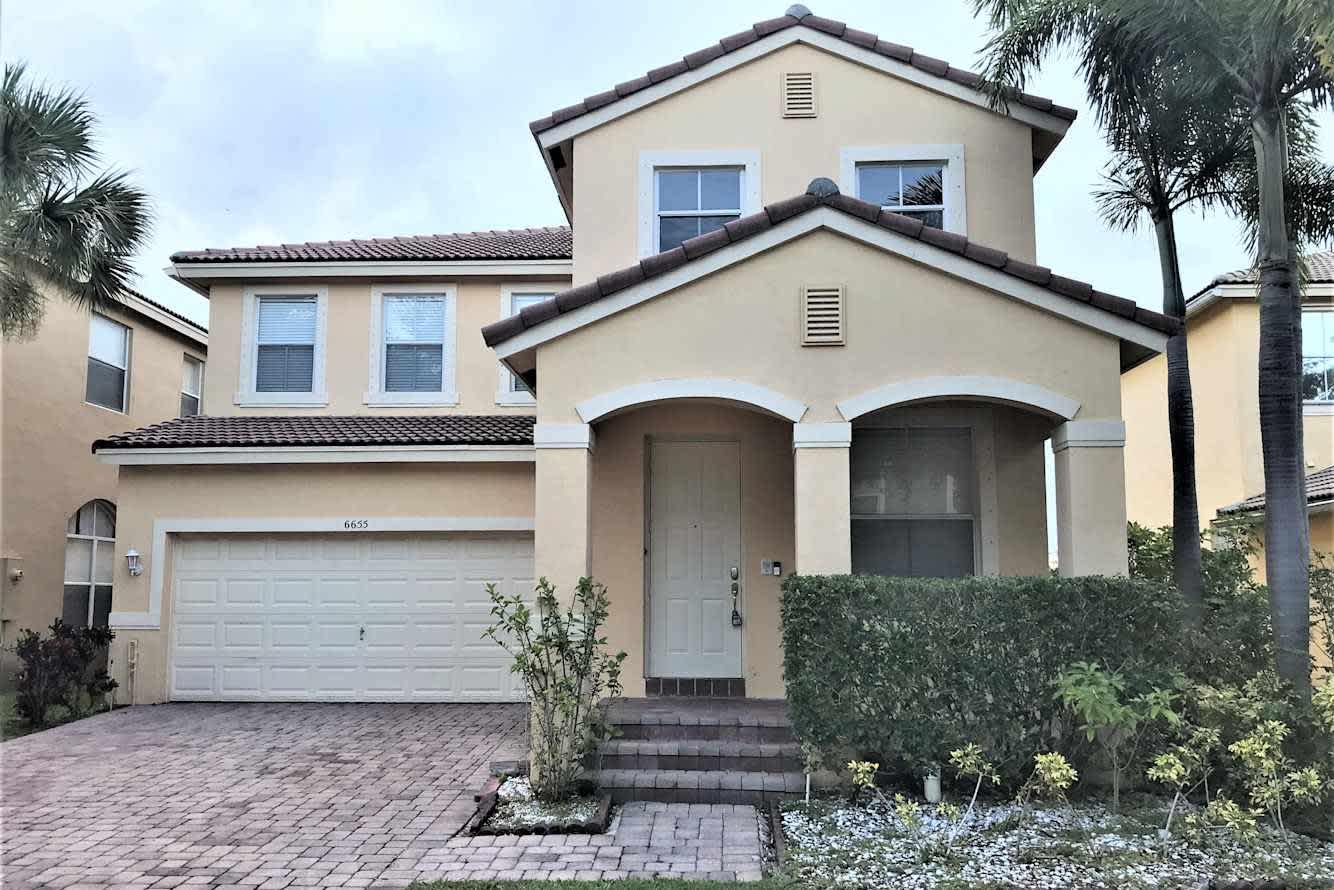 Front of 6655 Jacques Way, Lake Worth, FL