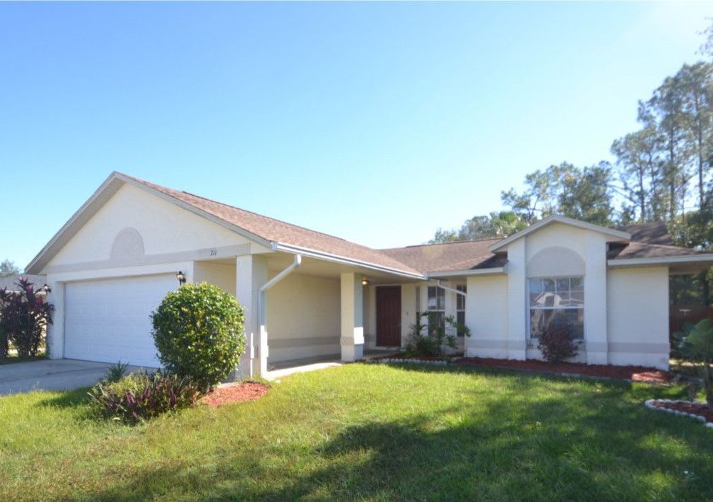 Front of 711 Swan Way, Kissimmee, FL
