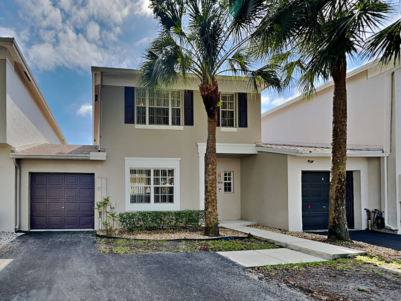 Front of 9430 E Plum Harbor Way, Tamarac, FL